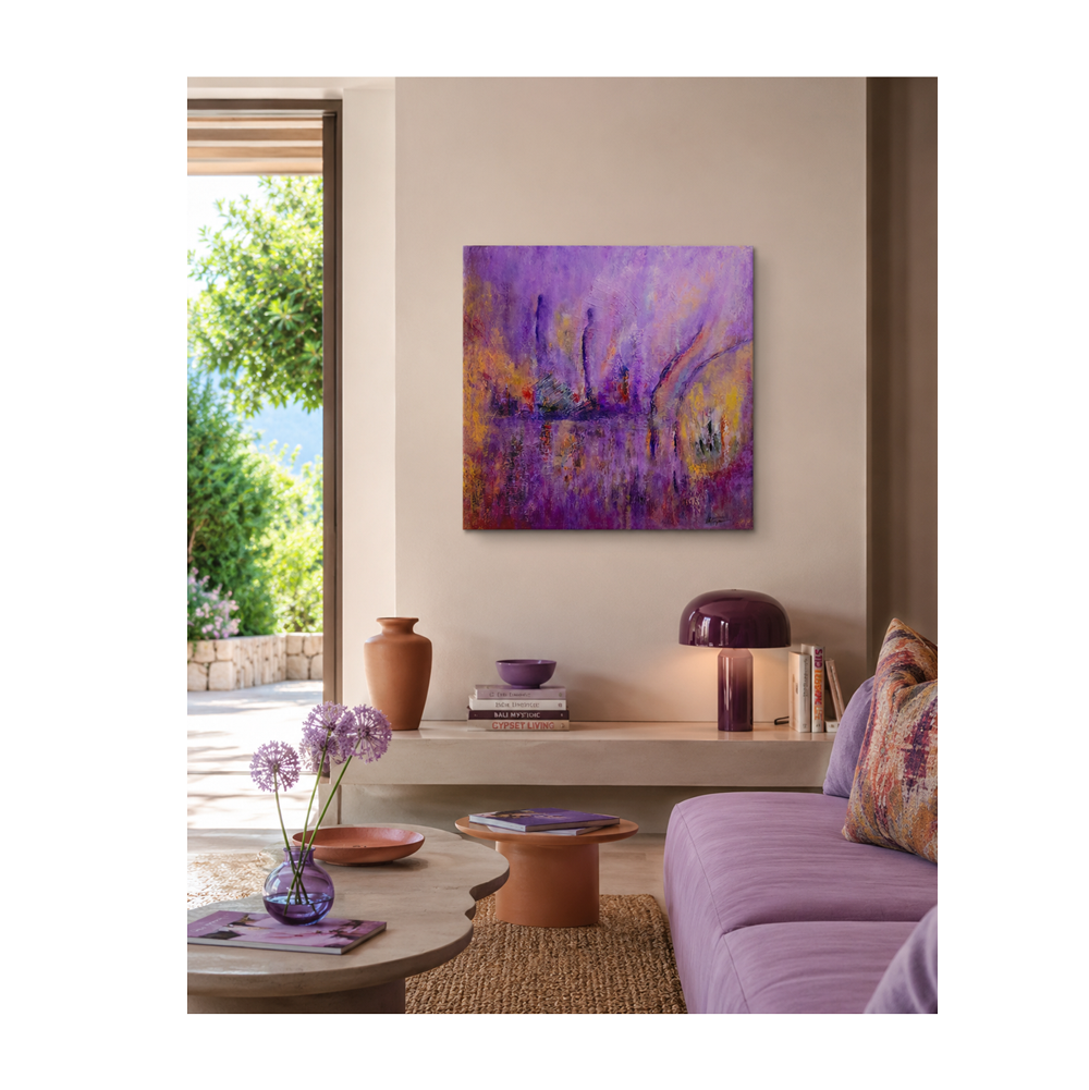 A square abstract painting with vibrant purple, magenta, and gold brushstrokes hangs on a beige wall in a modern, stylishly decorated living room with a purple sofa, terracotta vases, and a wooden coffee table.