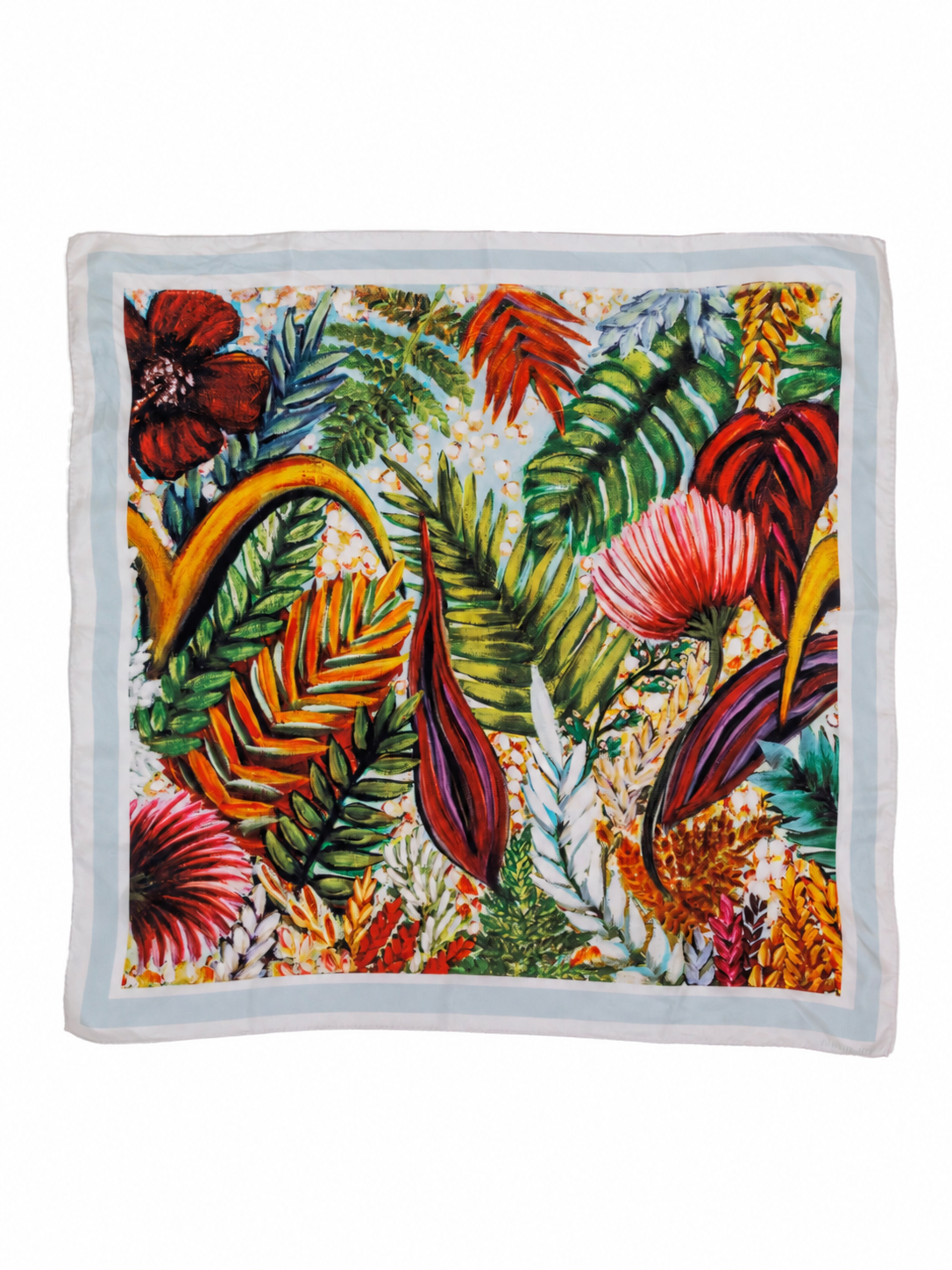 A square scarf with a vibrant tropical floral and leaf print, featuring green palm fronds, red and pink flowers, and orange accents on a light background, finished with a solid white border.